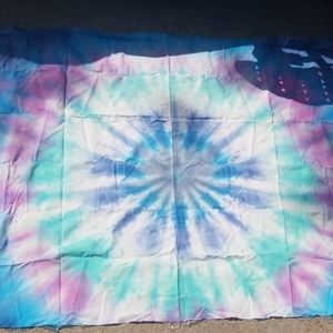 Blue, pink, green, and white large tapestry